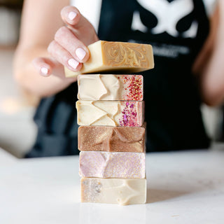 Stack of sparkly cold process soaps made by Blissed Botanical Co